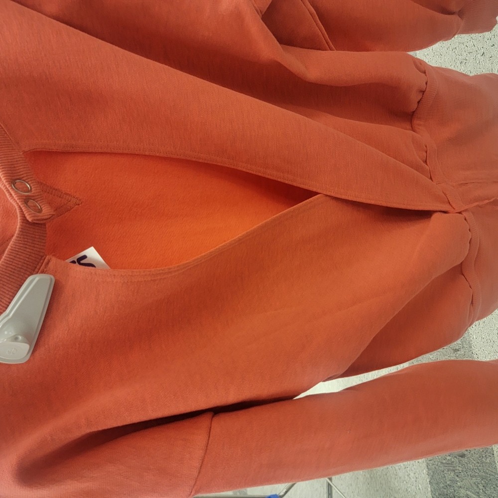 Coral FP Movement sweatshirt bodysuit.